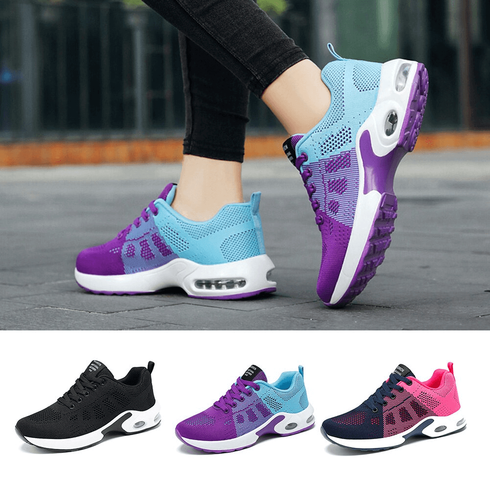 Person wearing purple and blue breathable, wear-resistant lace-up cushioned running shoes.